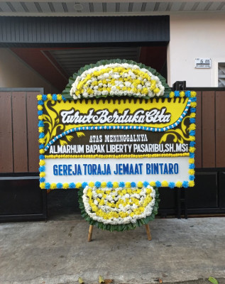 Papan Bunga Duka di Joyosuran